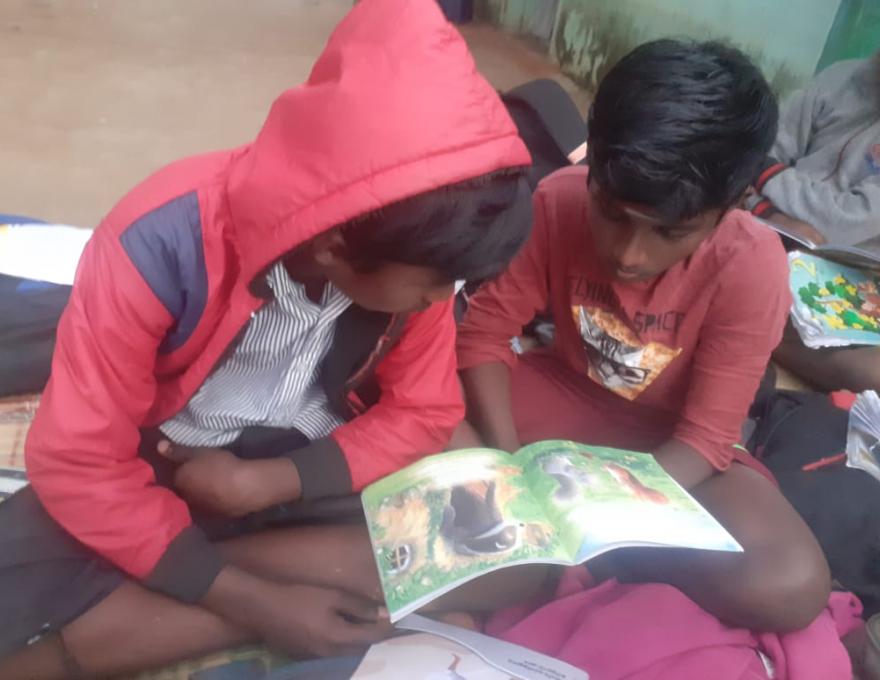 Thumbi Book reading children 